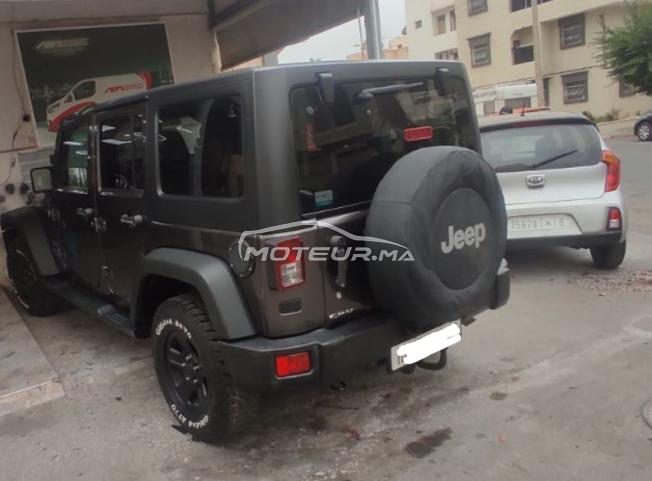 Jeep Wrangler Sport avec caravane tout terrain